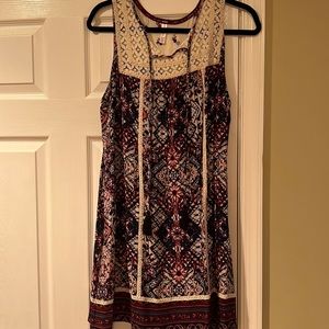 Printed dress worn once with beautiful lace detail